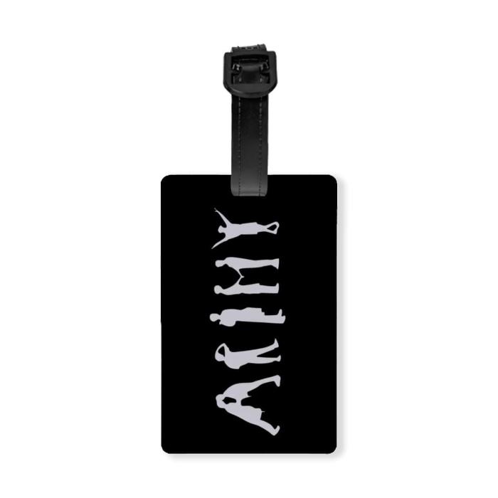 A suitcase with a back luggage tag with a white ARMY sign design inspired by BTS