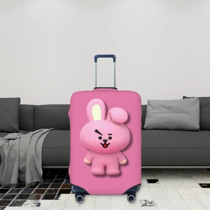 Travel suitcase with pink  Cooky BT21 design cover in livingroom