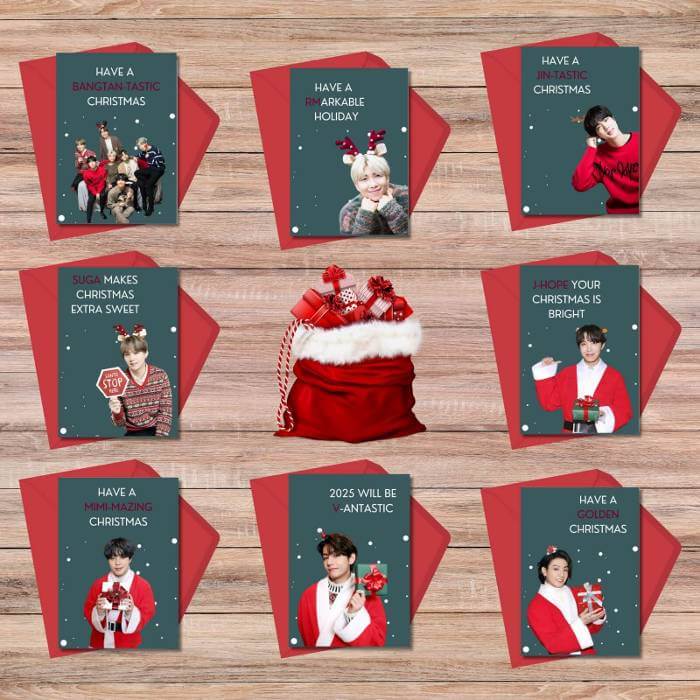 BTS Christmas postcards with 8 festive designs, featuring individual members and group photo, set on a wooden background.