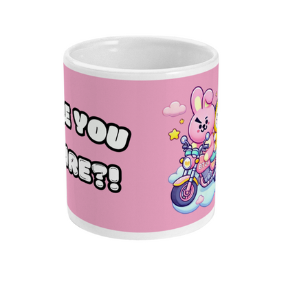 front side image of white pink coloured mug with Chimmy Cooky ride a bike design representing Jimin and Jungkook