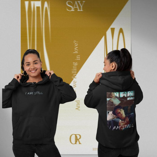 Girl showing front and back of pullover hoodie with JK cinema promo design