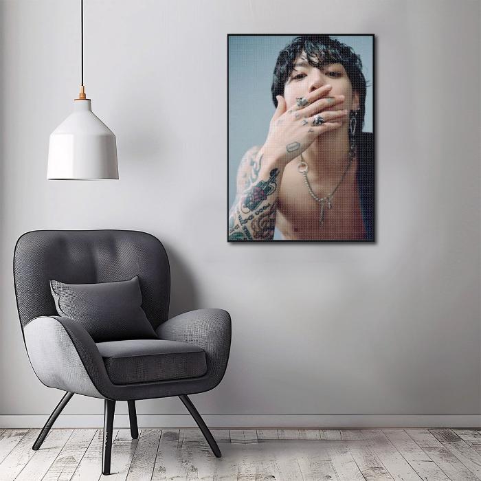 Wallart diamond painting of Jungkook in livingroom with chair and hanging lamp