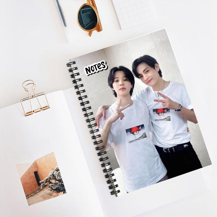 mockup notebook vmin friends design on a table