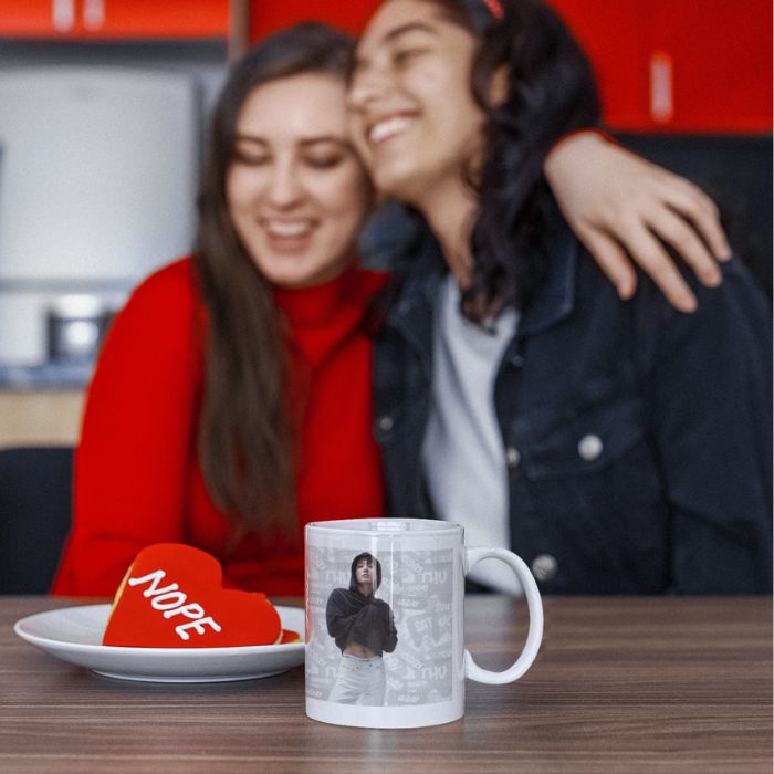 Two girls in kitchen with jungkook of bts seven mug