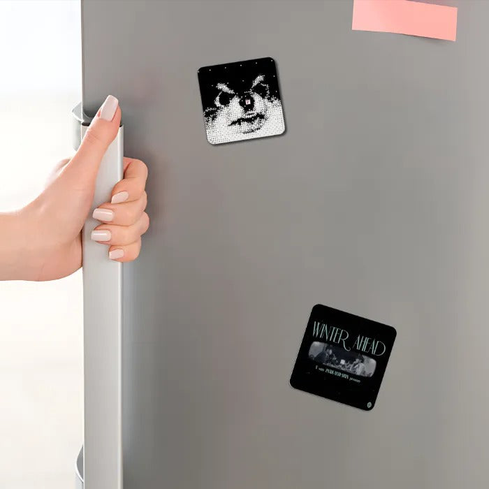 Taehyung Acrylic Magnet – Layover Album & Winter Ahead Song on a fridge held by a woman