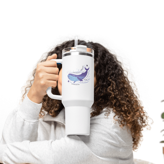 Girl with curly hair holding Whalien BTS travel mug