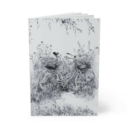 Notebook with namjoon wildflower and a bike design