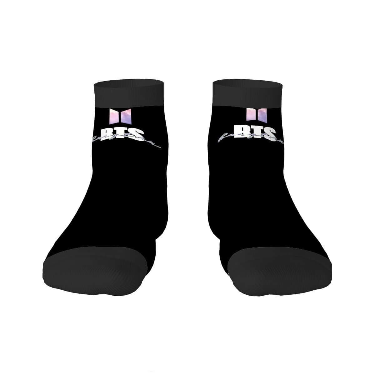 Black BTS tube socks with subtle BTS logo, made of polyester and spandex, perfect for fans and holiday gifting.