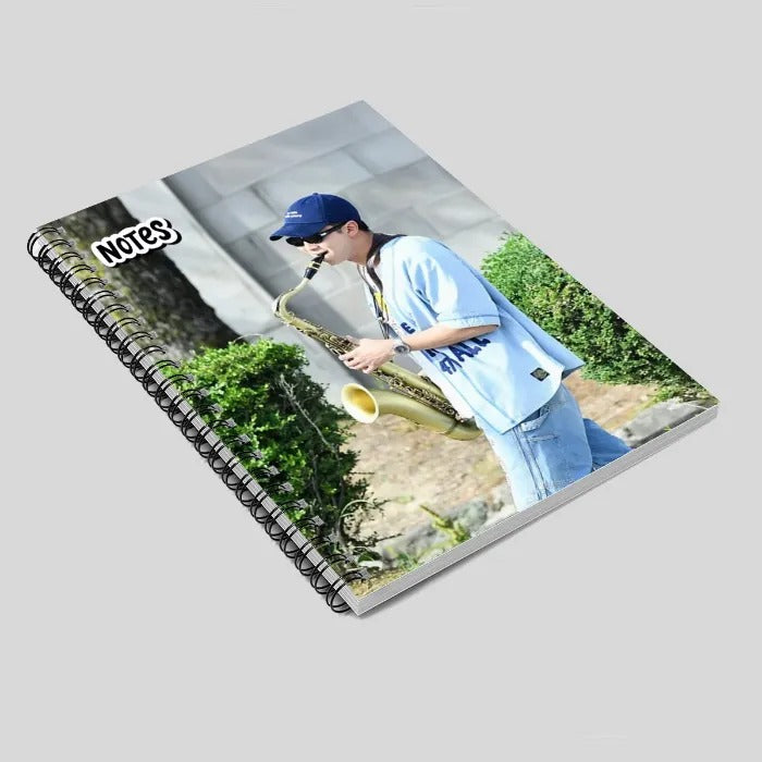 Mockup of notebook RM Namjoon holding a saxophone