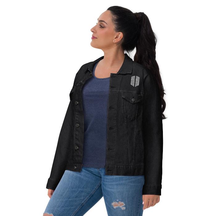 BTS-inspired black denim jacket with Bangtan logo on the front, worn by a woman in everyday wear.